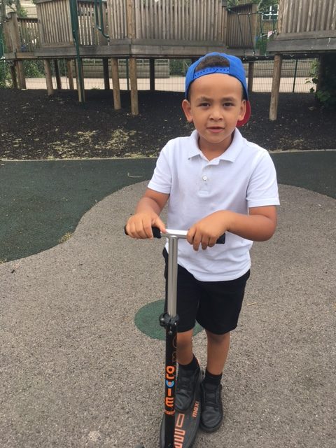 Pupil on scooter